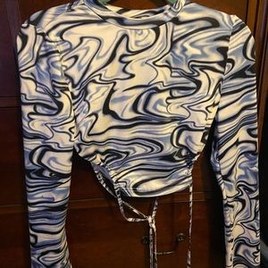 Long sleeve crop top, abstract design, women’s size Small